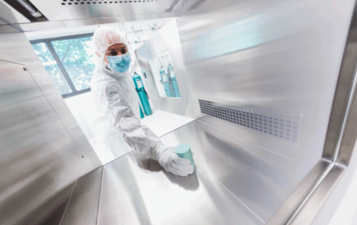 A technician handles a so-called ‘pig’, a lead-lined safety vessel containing the radiopharmaceutical vial. Credit: All rights reserved, Advanced Accelerator Applications